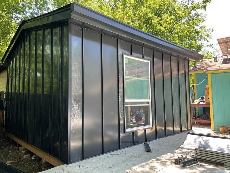 Black standing seam metal wall panels for Roof Inspection in North East