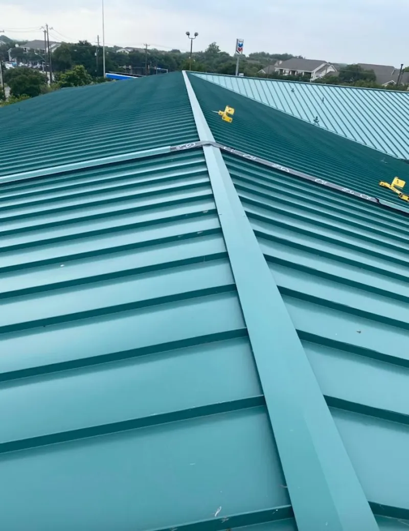 Green commercial metal roof ridge and valley for Metal Roof Repair in North East